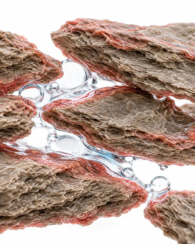 Concept illustration of liquid conditioning layered clay particles.